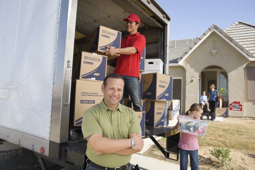Professional van service in Richmond with movers unloading items